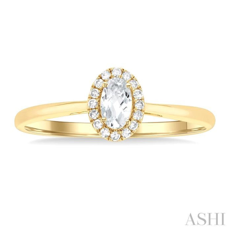 5x3 MM Oval Shape White Topaz and 1/20 Ctw Single Cut Diamond Halo Semi-Precious Ring in 14K Yellow Gold