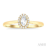 5x3 MM Oval Shape White Topaz and 1/20 Ctw Single Cut Diamond Halo Semi-Precious Ring in 14K Yellow Gold