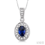 6x4mm Oval Cut Sapphire and 1/8 Ctw Round Cut Diamond Pendant in 14K White Gold with Chain
