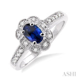 6x4mm Oval Cut Sapphire and 1/6 Ctw Single Cut Diamond Ring in 14K White Gold