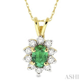 6x4MM Oval Cut Emerald and 1/4 Ctw Round Cut Diamond Pendant in 14K Yellow Gold with Chain