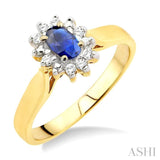 5x3mm Oval Cut Sapphire and 1/10 Ctw Round Cut Diamond Ring in 14K Yellow Gold