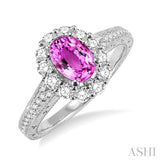 7x5mm Oval Cut Pink Sapphire and 1/2 Ctw Round Cut Diamond Ring in 14K White Gold