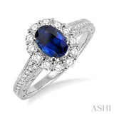 7x5mm Oval Cut Ceylon Sapphire and 1/2 Ctw Round Cut Diamond Ring in 14K White Gold