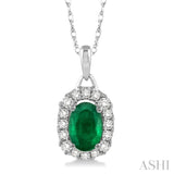 6x4 MM Oval Cut Emerald and 1/6 Ctw Round Cut Diamond Pendant in 14K White Gold with Chain